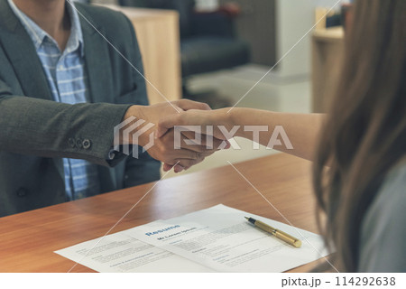 Team Business Partners shaking hands together to Greeting Start up small business in meeting room. Shakehand teamwork partners at modern office handshake together. Business mergers and acquisitions 114292638