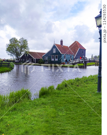 Netherlands rural lanscape Windmills at famous tourist site Zaanse Schans in Holland. Zaandam, Netherlands 114293530