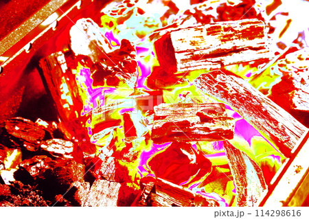 Grill with flaming charcoal briquettes, food background or texture, close-up, altered color scheme. 114298616