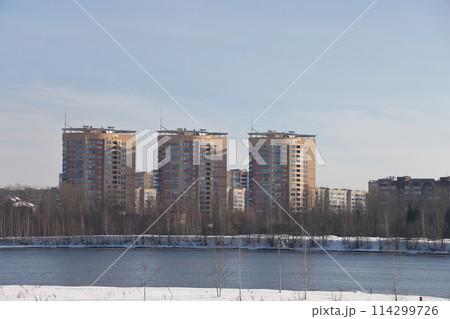 river on a sunny evening. Trees and shrubs. Landscape of winter nature, river banks  114299726