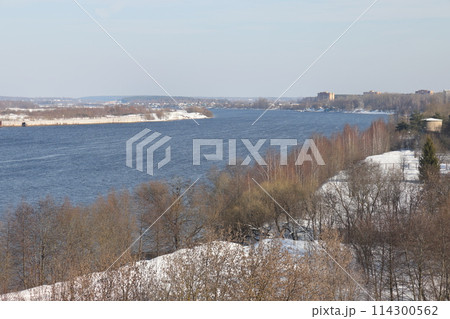 river on a sunny evening. Trees and shrubs. Landscape of winter nature, river banks river on a sunny evening. Trees and shrubs. Landscape of winter nature, river banks 114300562