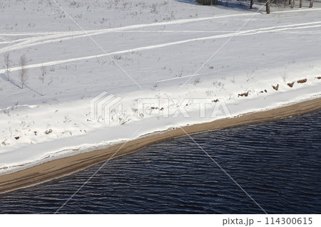 river on a sunny evening. Trees and shrubs. Landscape of winter nature, river banks river on a sunny evening. Trees and shrubs. Landscape of winter nature, river banks 114300615