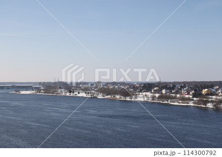 river on a sunny evening. Trees and shrubs. Landscape of winter nature, river banks river on a sunny evening. Trees and shrubs. Landscape of winter nature, river banks 114300792