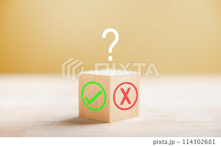 Wooden block illustrates choice with green check mark and red x. Decision-making concept highlighted. Think With Yes Or No Choice. 114302681