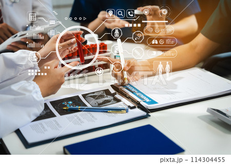 Doctor team, analysis the blood test examination results and medication usage of the patient on the chart, medical check-up concept. Doctor team, analysis the blood test examination results and medication usage of the patient on the chart, medical check-up concept. 114304455