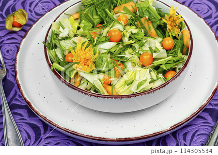 Salad from wild plants and physalis. Salad from wild plants and physalis. 114305534
