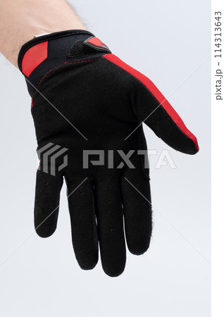 Human hand in black sport glove Human hand in black sport glove 114313643