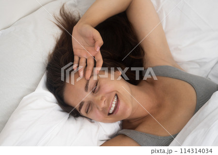 Daylight Delight: With a smile, she awakens and stretches, ready to embrace the opportunities of a new day.  114314034