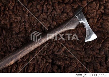 Battle axe on sheep fur Battle axe on sheep fur 114314549