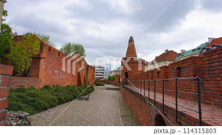 Barbican fortress in the historic center of Warsaw. Poland. 114315803