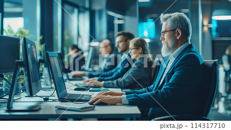 Group of People Working on Computers 114317710