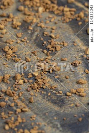 brown pieces of instant coffee for making a coffee drink 114321348