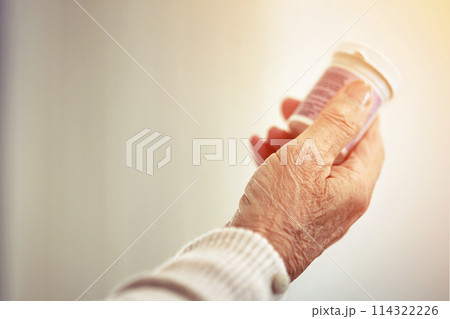 Medicine, woman and hands with a bottle of pills for recovery, health and wellness. Healthcare, medication and closeup of a senior female person with prescription tablets, supplements or vitamins. Medicine, woman and hands with a bottle of pills for recovery, health and wellness. Healthcare, medication and closeup of a senior female person with prescription tablets, supplements or vitamins. 114322226