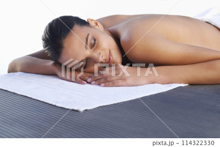 Spa, sleeping or face of woman ready for luxury treatment, facial skincare or beauty for wellness. Towel, healing therapy or zen female client on bed to start massage, detox or chemical peel to relax 114322330