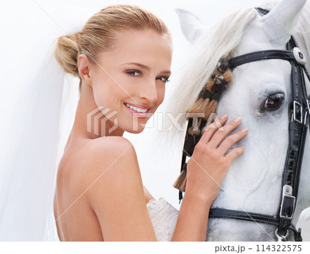 Bride, smile and horse with face, portrait and countryside for nature, connection and celebration. Woman, animal and uk field for wedding, love and happiness with summer, meadow and horse riding 114322575