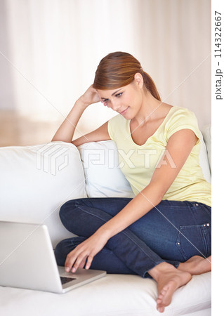 Woman, laptop and relax on sofa in home to watch movies, digital news subscription or streaming multimedia. Computer, online shopping or research blog, social network or happy download in living room Woman, laptop and relax on sofa in home to watch movies, digital news subscription or streaming multimedia. Computer, online shopping or research blog, social network or happy download in living room 114322667
