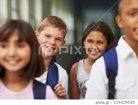 Boy, portrait and friends in corridor or happy with backpack or pride for learning, education or knowledge. Student, people and face with smile in building or hallway before class or ready to study Boy, portrait and friends in corridor or happy with backpack or pride for learning, education or knowledge. Student, people and face with smile in building or hallway before class or ready to study 114324593