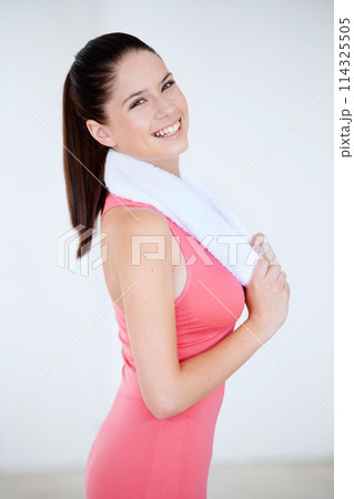 Laughing, gym or portrait of happy woman with towel for fitness or wellness with confidence. Smile, model or face of healthy sports person ready to start workout, training or exercise with energy 114325505