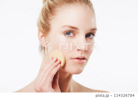 Cotton pad, skincare or portrait of a model in studio for cleaning, beauty or dermatology treatment. White background, face or confident woman with pad for facial, toner and cosmetics with foundation Cotton pad, skincare or portrait of a model in studio for cleaning, beauty or dermatology treatment. White background, face or confident woman with pad for facial, toner and cosmetics with foundation 114326784