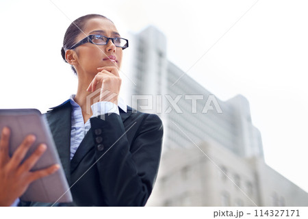 Lawyer, thinking or woman with tablet in city for legal research, online app or social media post. Attorney, low angle or advocate with business email, networking or internet article ideas for travel Lawyer, thinking or woman with tablet in city for legal research, online app or social media post. Attorney, low angle or advocate with business email, networking or internet article ideas for travel 114327171