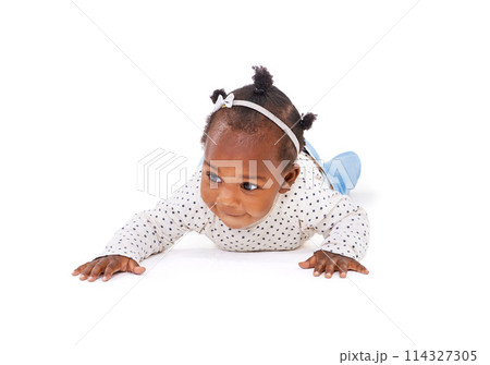 Black baby, curious or crawl to explore, play or learn of mobility, motor skill or child development. Girl, toddler or crawling on tummy time, growth or progress on mockup on white background 114327305