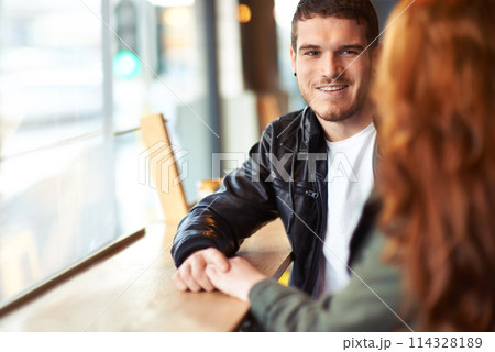 Man, couple and date in coffee shop, hand holding for love and romantic affection. Boyfriend, support together for bonding relationship, female person at table for trust comfort and compassion Man, couple and date in coffee shop, hand holding for love and romantic affection. Boyfriend, support together for bonding relationship, female person at table for trust comfort and compassion 114328189