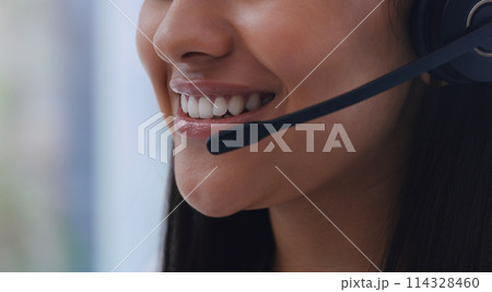 Call center, woman and happy with closeup of headset for customer support, telesales advisor and communication. Telemarketing, consultant or hotline agent with smile for helpdesk, advice and talking Call center, woman and happy with closeup of headset for customer support, telesales advisor and communication. Telemarketing, consultant or hotline agent with smile for helpdesk, advice and talking 114328460