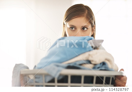 Thinking, woman and cleaning laundry in home and planning to tidy basket with dirty clothes, Girl, washing and cleaner start task in apartment with container of linen, fabric and maid with ideas Thinking, woman and cleaning laundry in home and planning to tidy basket with dirty clothes, Girl, washing and cleaner start task in apartment with container of linen, fabric and maid with ideas 114328797