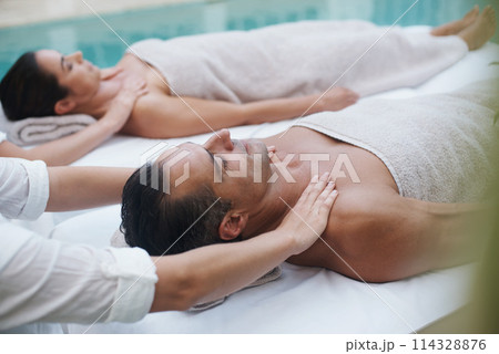 Spa, man and hands with massage for wellness at resort, luxury hotel and vacation for relax and therapeutic pamper. People, masseuse and body care with shoulder treatment, hospitality and zen outdoor Spa, man and hands with massage for wellness at resort, luxury hotel and vacation for relax and therapeutic pamper. People, masseuse and body care with shoulder treatment, hospitality and zen outdoor 114328876