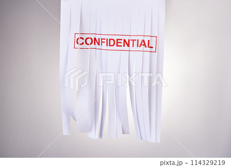 Secret, report and shred of paper, studio and money laundering in business, criminal and evidence in document. Confidential, corporate fraud and embezzlement of funds by government and scam of public 114329219