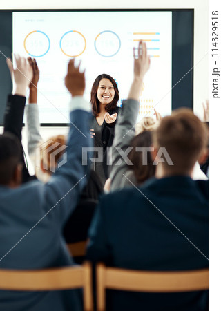 Businesswoman, presentation and hands up in audience for conference with graphs, review or questions. Female person, trade show and back in meeting convention for mentorship, statistics or percentage Businesswoman, presentation and hands up in audience for conference with graphs, review or questions. Female person, trade show and back in meeting convention for mentorship, statistics or percentage 114329518