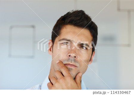 Entrepreneur, man and glass board with thinking at office for idea or vision for startup company with growth, planning and brainstorm. Corporate, contemplate and reflect on strategy for project 114330467