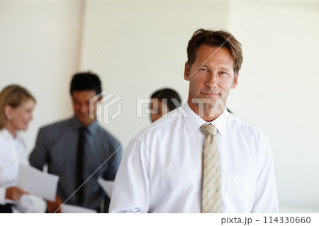 Corporate, meeting and portrait of businessman with smile for team building, planning and collaboration. Employee, happy and confident in office for brainstorming, workshop or teamwork in conference 114330660