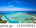 【沖縄・宮古島】狩俣漁港上空から池間島、池間大橋、青い海をドローンで撮影① 114330683