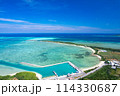 【沖縄・宮古島】狩俣漁港上空から池間島、池間大橋、青い海をドローンで撮影④ 114330687