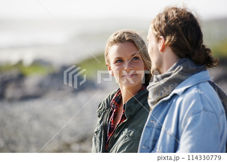 Happy, love and couple by ocean in winter for bonding, loving relationship and relax outdoors. Nature, travel and man and woman by seaside for holiday, vacation and weekend together for romance Happy, love and couple by ocean in winter for bonding, loving relationship and relax outdoors. Nature, travel and man and woman by seaside for holiday, vacation and weekend together for romance 114330779