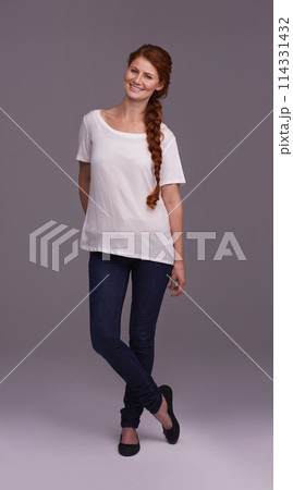 Studio, fashion and portrait of woman with smile for confidence, trendy clothes and stylish on grey background. Female person, happy and face with pose for cool outfit, pride and satisfaction 114331432