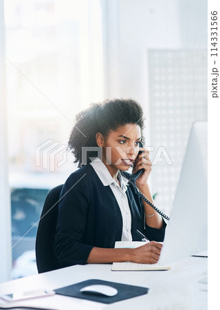 Phone call, receptionist or black woman on computer for writing, contact or business for planning. PA, talking or secretary with telephone, journal or diary notes for communication or appointment 114331566