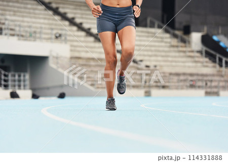 Runner, fitness and legs of woman track for athlete, exercise and sports for competition. Race, stadium and shoes for cardio event for professional female person, workout and sprint for run training 114331888