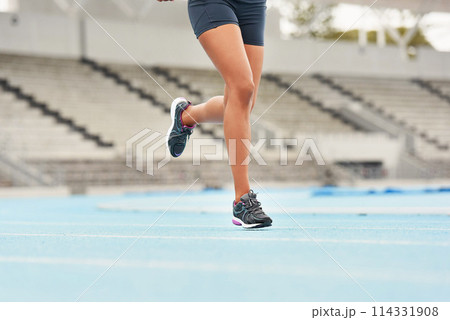 Runner, track and woman athlete on legs, fitness and outdoor exercise for sports competition. Race, stadium position and field cardio event for female person, workout and sprint for fast training 114331908