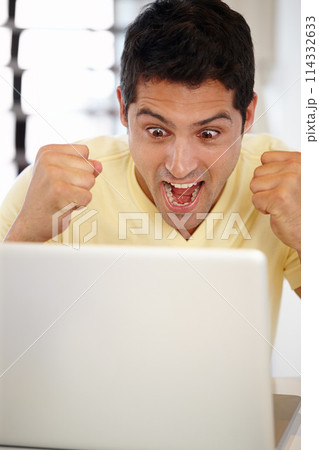 Man, excited and laptop in office for internet, research online and website for company. Young person, editor and happy with tech for typing, email and creative project for work, job and success 114332633