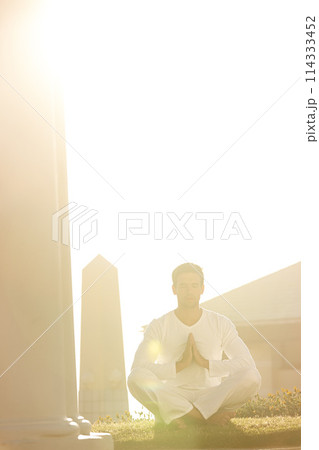 Man, sunshine and meditation for yoga outdoor, zen and wellness with prayer hands for holistic healing. Calm, peace and natural light with fresh air, mindfulness and energy balance for aura in park Man, sunshine and meditation for yoga outdoor, zen and wellness with prayer hands for holistic healing. Calm, peace and natural light with fresh air, mindfulness and energy balance for aura in park 114333452