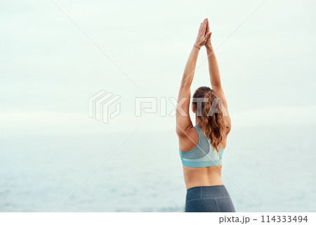 Woman, stretching or yoga for meditation, pilates or wellness for zen or relax for exercise or workout. Yogi, fitness or balance chakra for peace environment, calm mindfulness or breathing and health 114333494