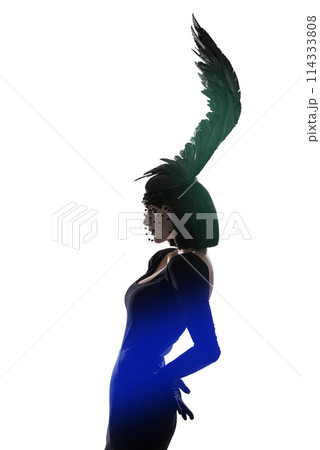 Feather, fashion and unique style woman in a studio with head piece, bird hat and art with gothic creativity. Crow, silhouette and shadow with fantasy and with goth trend and white background Feather, fashion and unique style woman in a studio with head piece, bird hat and art with gothic creativity. Crow, silhouette and shadow with fantasy and with goth trend and white background 114333808