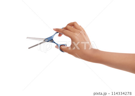 Barber, scissors and hand of person in studio for hair care and beauty on white background. Hairdresser, tools and blade for cutting hairstyle, trim or grooming in salon with beautician or stylist Barber, scissors and hand of person in studio for hair care and beauty on white background. Hairdresser, tools and blade for cutting hairstyle, trim or grooming in salon with beautician or stylist 114334278