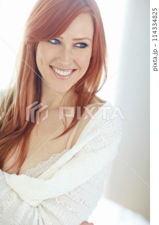 Woman, red hair and happy with lingerie at home for cosmetics, care and makeup for lifestyle. Girl, smile with sweater and seductive for love, sexy and skin for lover in house or sensual beauty Woman, red hair and happy with lingerie at home for cosmetics, care and makeup for lifestyle. Girl, smile with sweater and seductive for love, sexy and skin for lover in house or sensual beauty 114334825