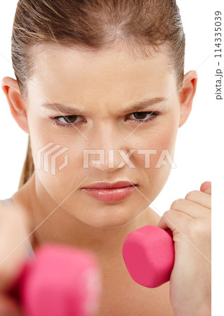 Dumbbells, girl and workout in studio, portrait and gym for wellness, bicep and exercise for health. White background, athlete and person with resilience, training and fitness for sports and strong 114335039