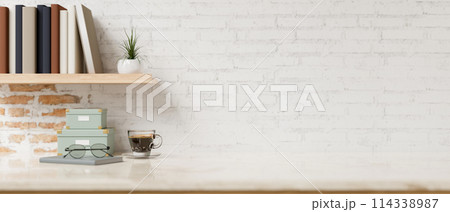 A space for showcase products on a white tabletop with objects against the rustic white brick wall. A space for showcase products on a white tabletop with objects against the rustic white brick wall. 114338987