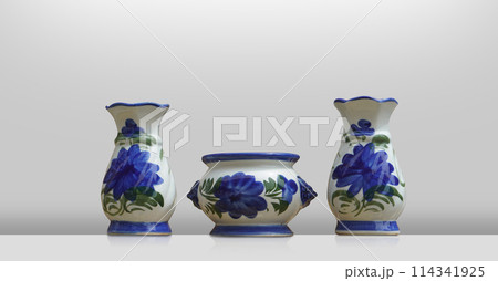 white and blue ceramic Incense burner and two white and blue flower vase on white floor and white background, object, decor, fashion, vintage, copy space 114341925