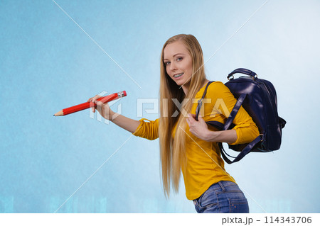 Young woman going to school Young woman going to school 114343706